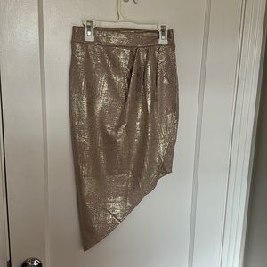 Asymmetrical rose gold metallic skirt. Size M.